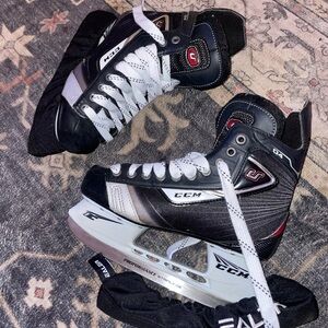 Vintage CCM U+ Youth Hockey Skates white laces and Black Accents unisex
